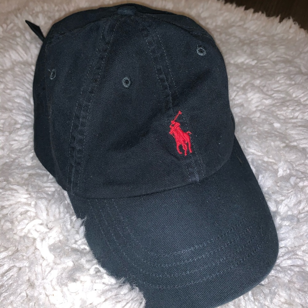 Navy blue with red logo polo hat